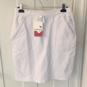 The Black Dog White Skirt